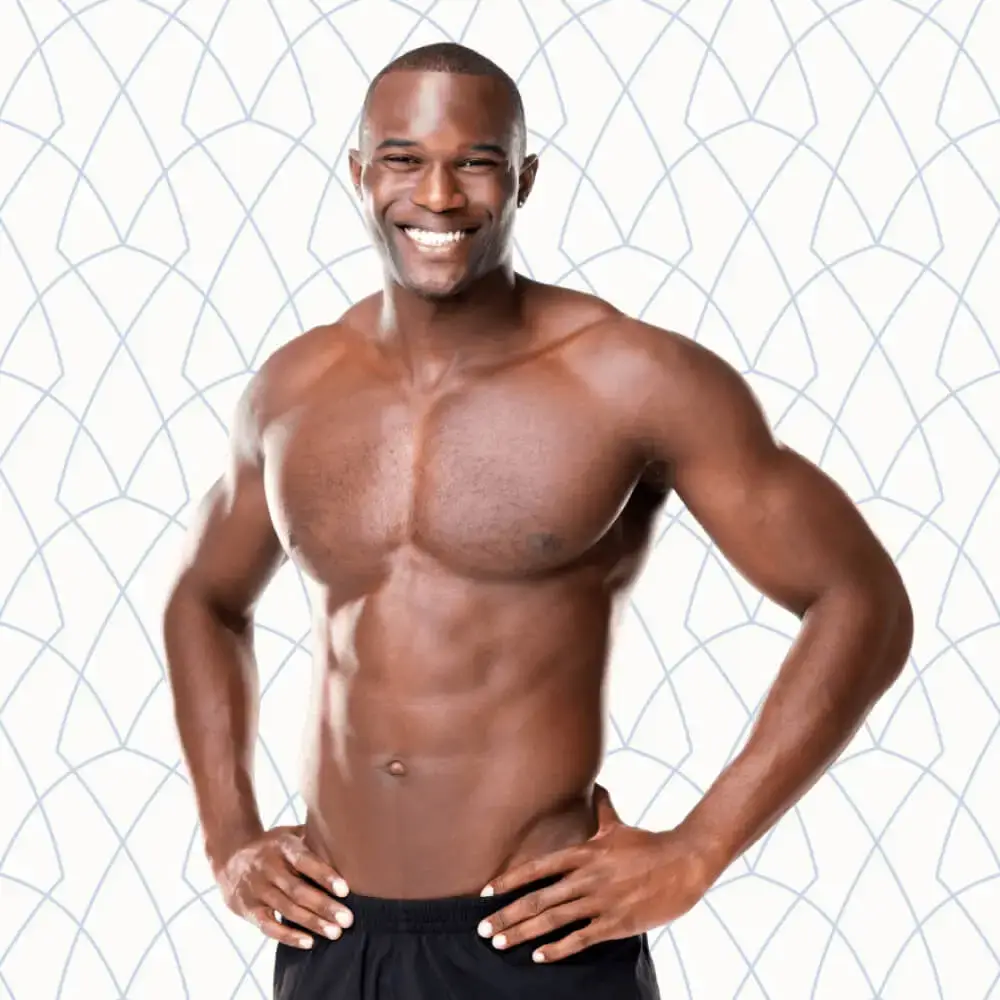 Middle-aged man smiling and posing with both hands on his hips | Body Contouring | Andromeda Medspa